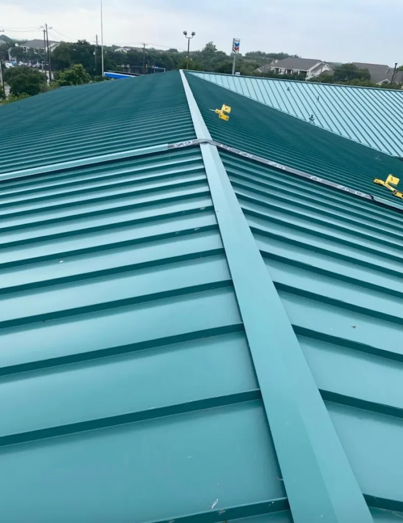 Green commercial metal roof ridge and valley for Metal Roof Repair in Helena Valley Northwest